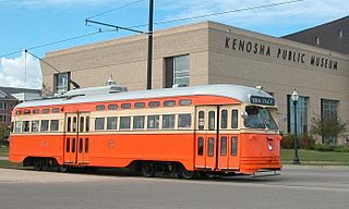 320px-kenosha_streetcar_4615_in_2005_passing_kenosha_public_museum
